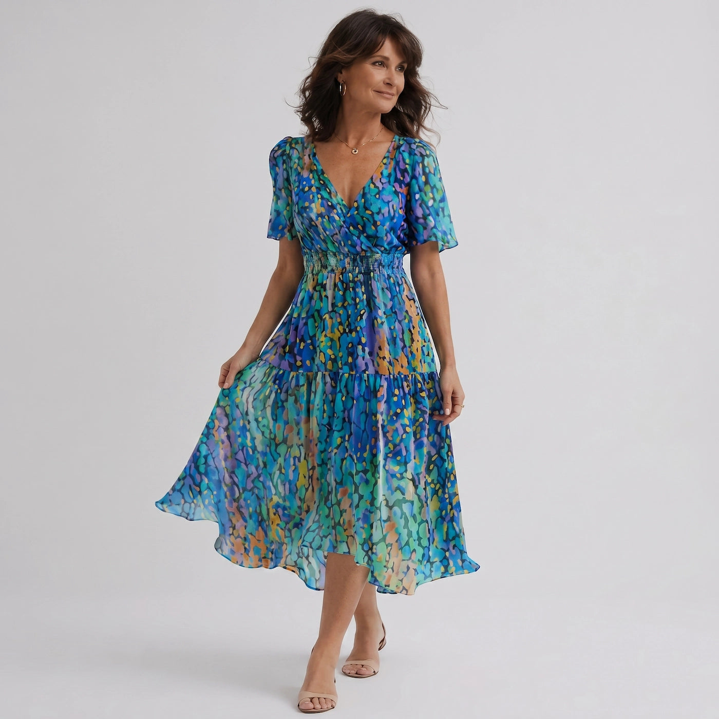 Collection de robes midi pour femme alliant élégance, fluidité et confort pour toutes les occasions.